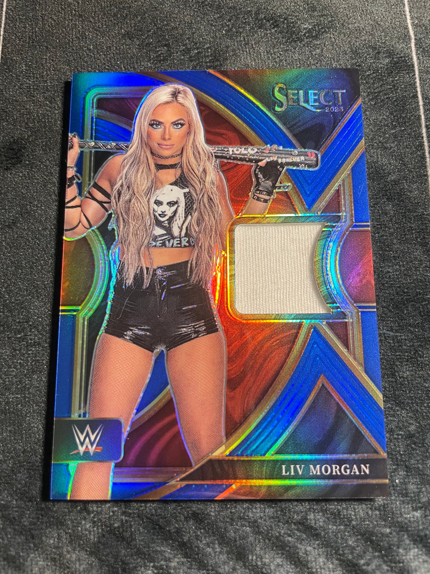 2023 Panini Select WWE Selective Swatches Blue Prizm /49 Liv Morgan #SW-LVM