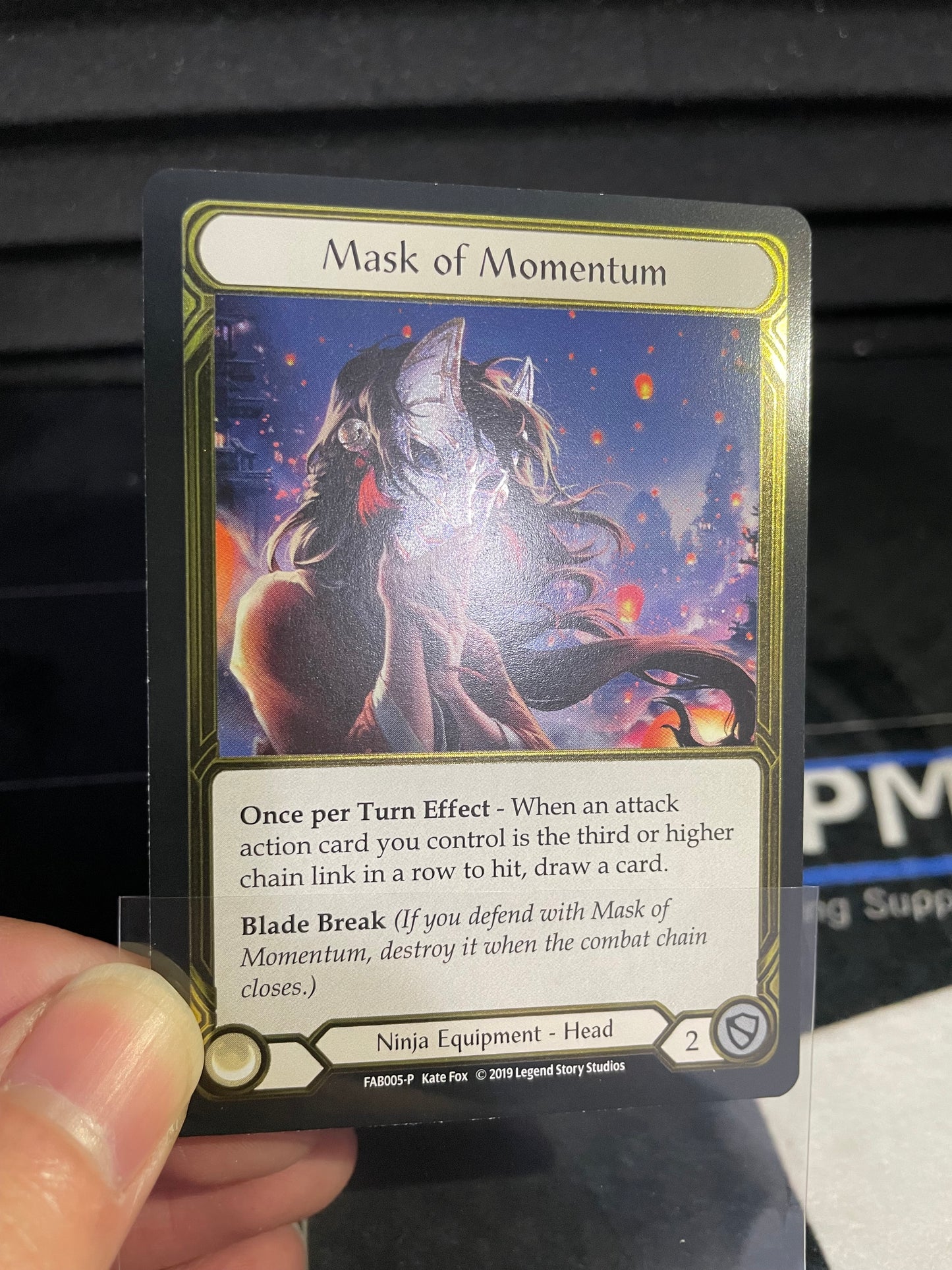 Mask of Momentum Gold Cold Foil Trophy Card Light Play