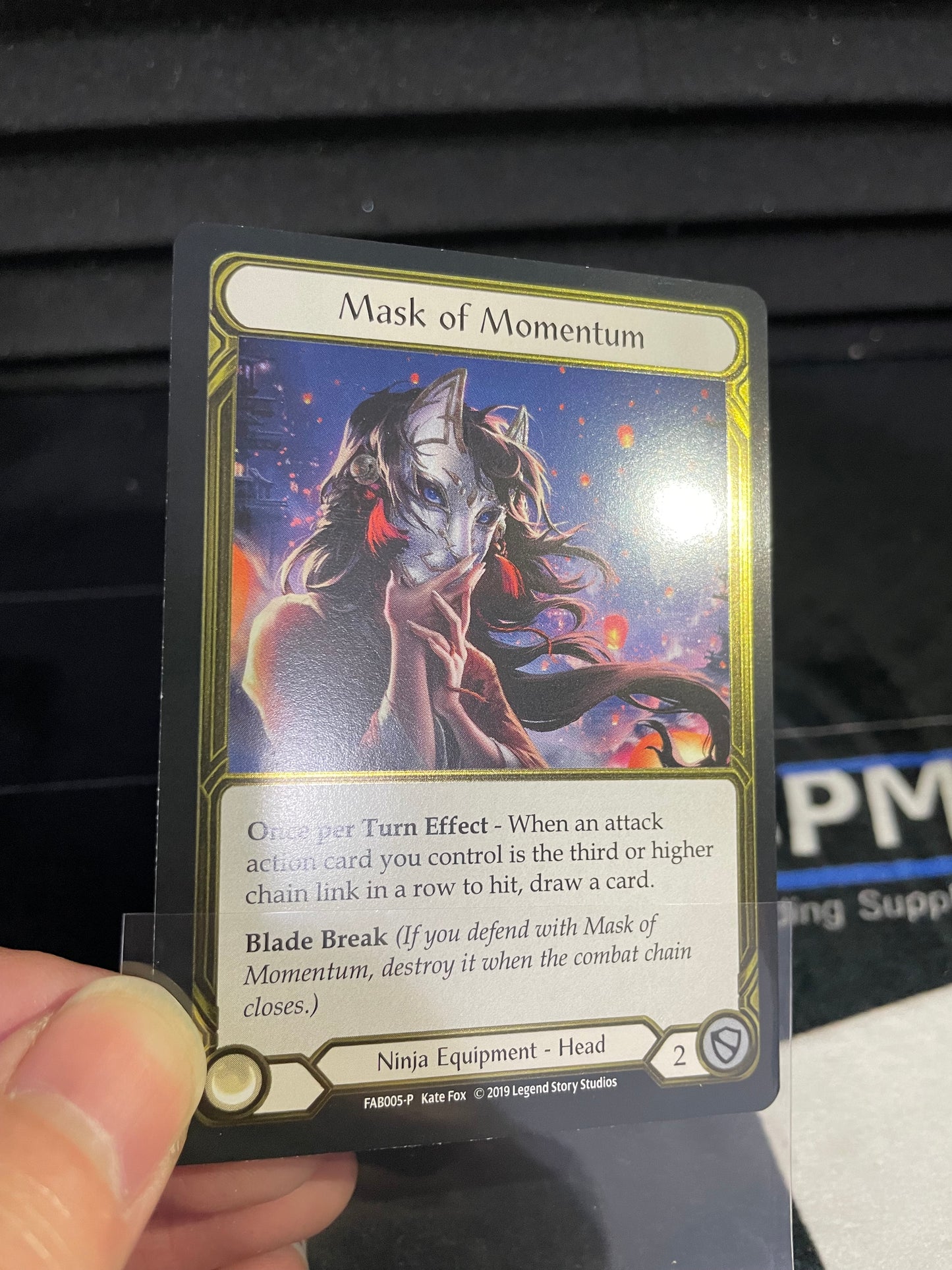 Mask of Momentum Gold Cold Foil Trophy Card Light Play