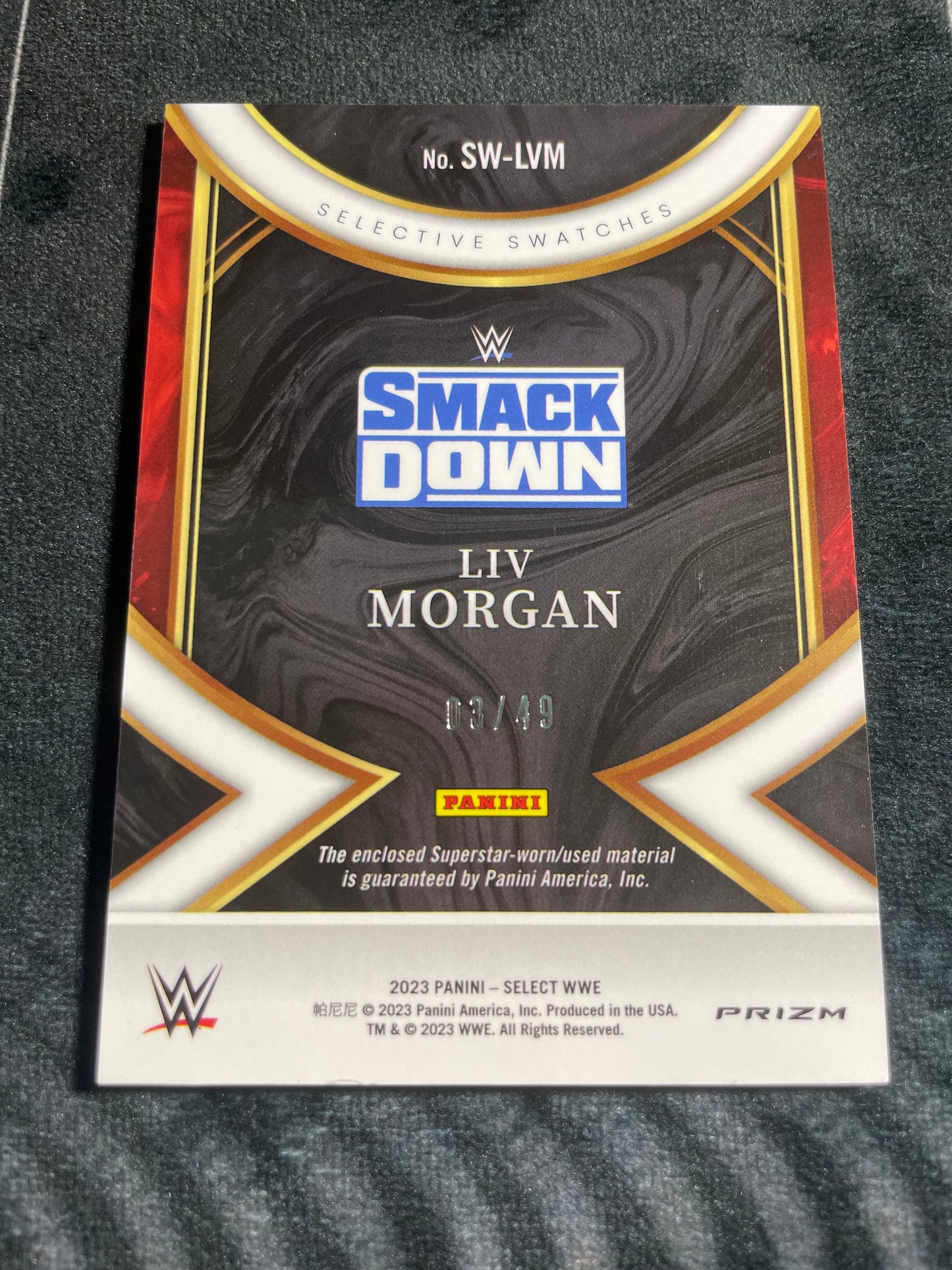 2023 Panini Select WWE Selective Swatches Blue Prizm /49 Liv Morgan #SW-LVM