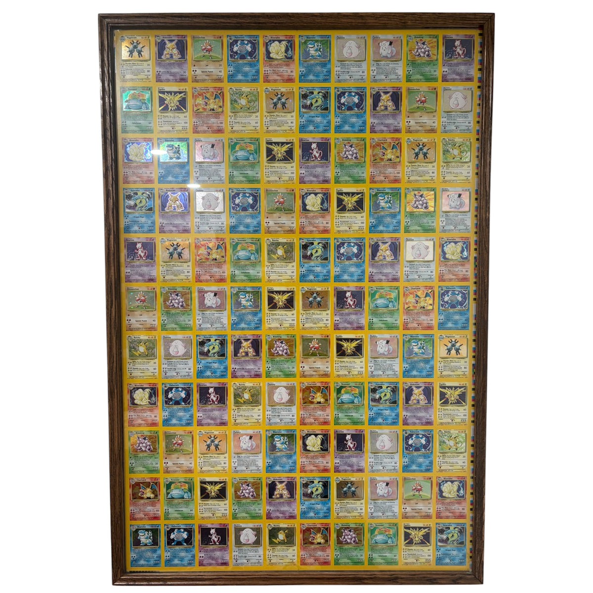 1999 HOLO RARE Base Set UNCUT SHEET of Pokemon Cards (110 Cards) - 7 Charizards