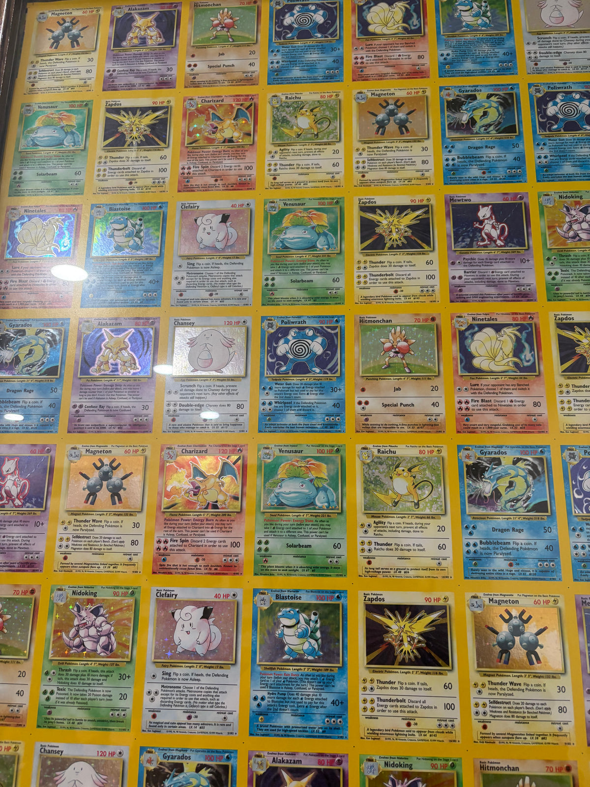 1999 HOLO RARE Base Set UNCUT SHEET of Pokemon Cards (110 Cards) - 7 Charizards